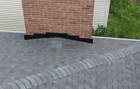 New flashing where the roof meets a brick chimney